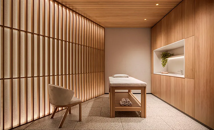 Sala de massagem com ripado de madeira e maca, no ZAHI Taunay