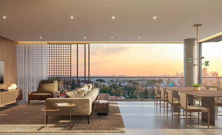 Sala de estar com varanda aberta e vista ao entardecer