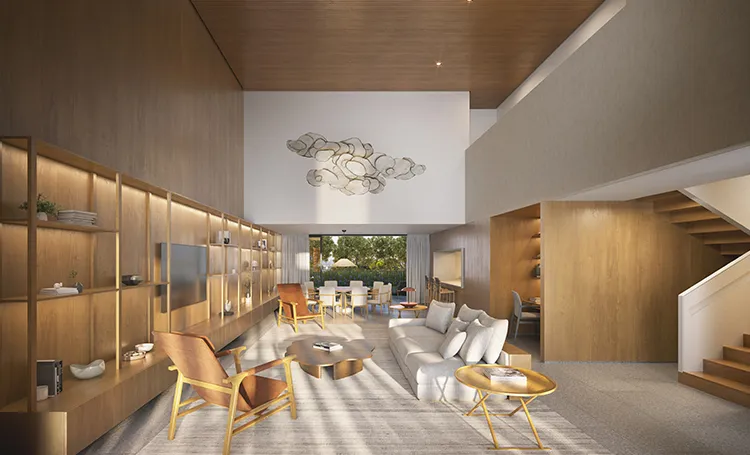 Sala de estar de pé-direito duplo com estantes de madeira e escada