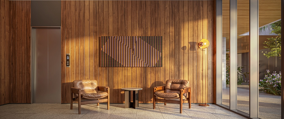 Hall com painel de madeira e poltronas no ZAHI Taunay