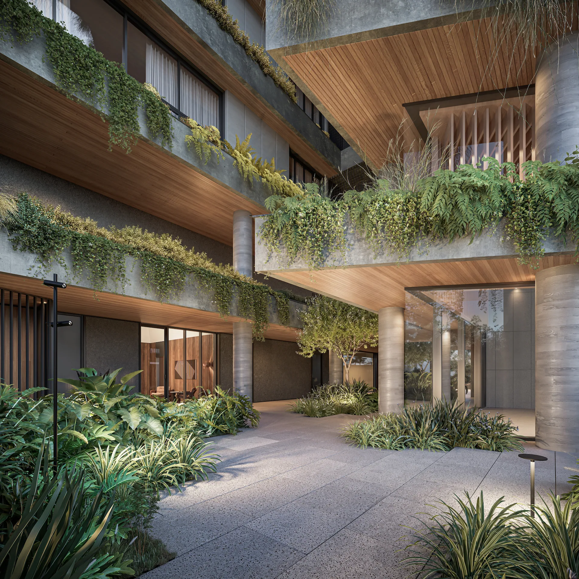 Pátio externo do ZAHI Taunay com varandas e plantas