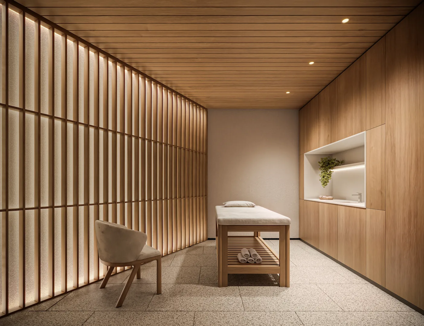 Sala de spa do ZAHI Taunay com maca e painel ripado