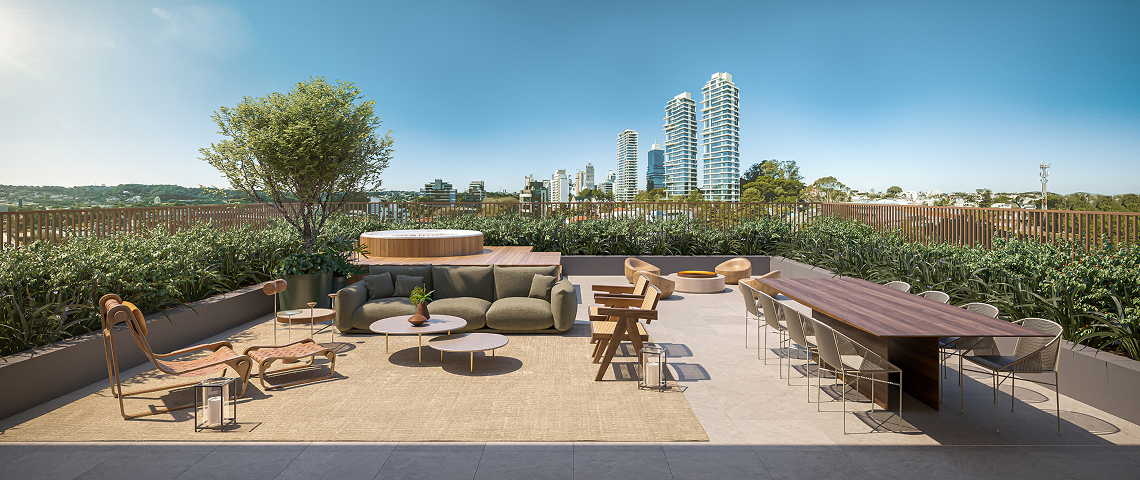 Terraço descoberto da Residência Jardim do BIOOS Barigui, em Curitiba, com área de estar, mesa para refeições ao ar livre, vegetação e vista para a cidade